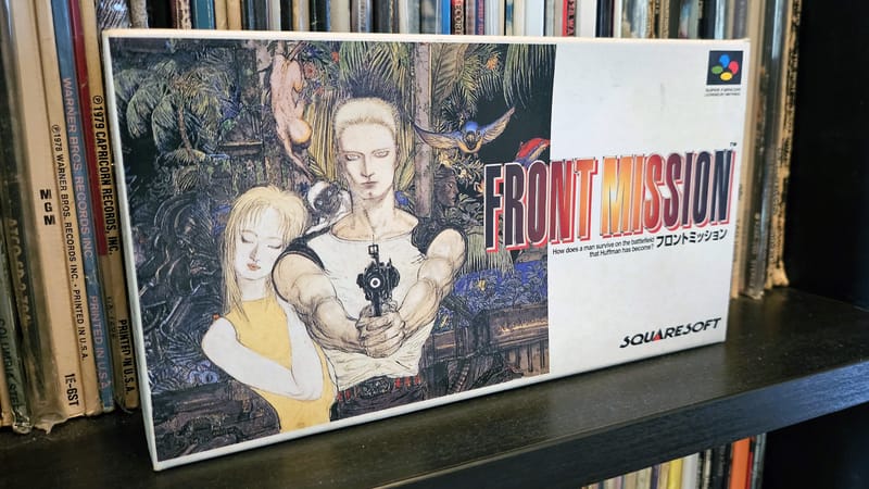 I'm giving away a boxed copy of Front Mission to celebrate 2,100 subscribers